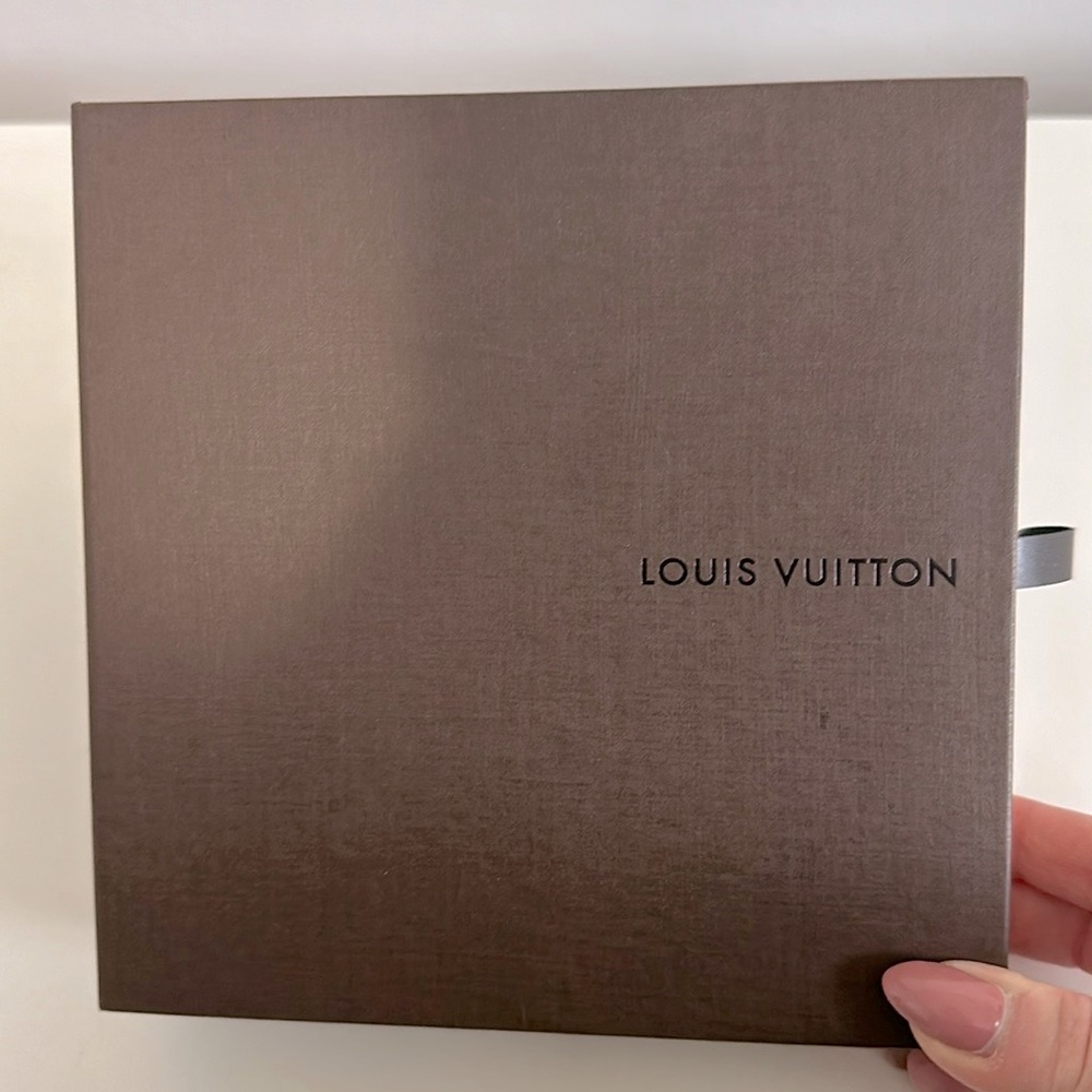 Louis Vuitton Box with pouch included.